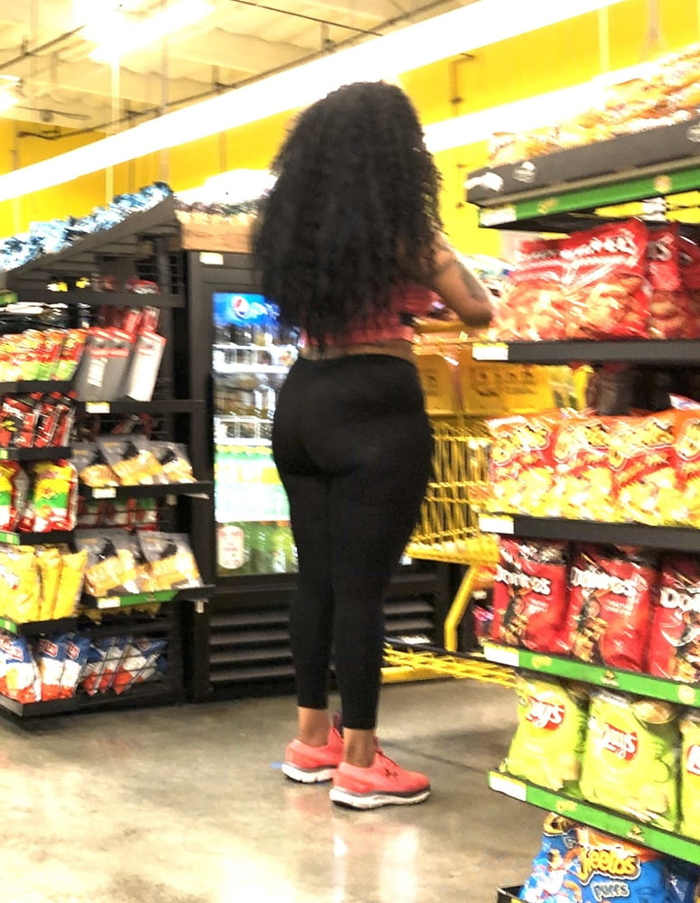 Black whore showing her ass #98691324