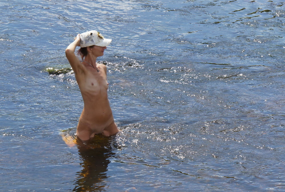 Nude in river's water #106939082