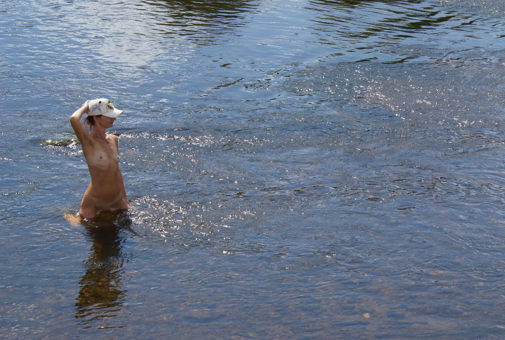 Nude in river's water #106939084