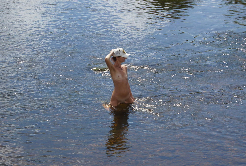 Nude in river's water #106939086
