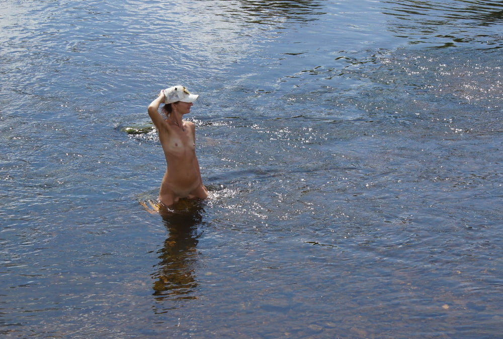 Nude in river's water #106939089