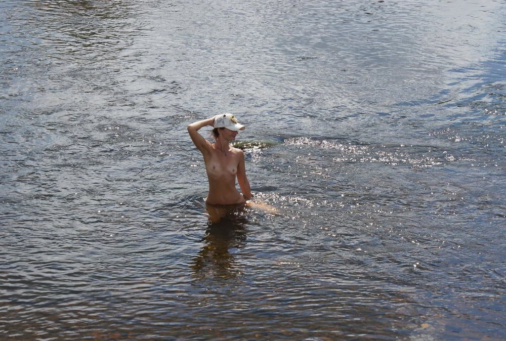 Nude in river's water #106939090