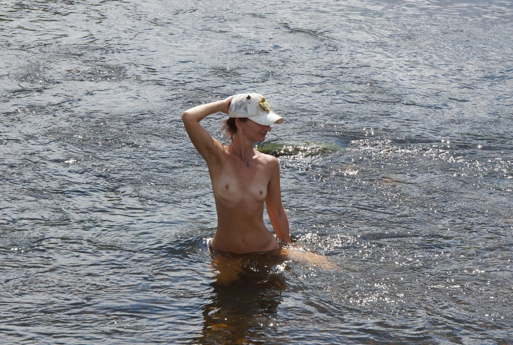 Nude in river's water #106939091