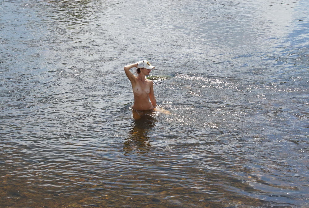 Nude in river's water #106939092