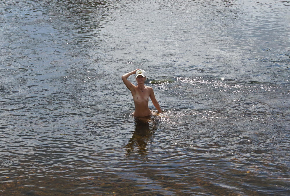 Nude in river's water #106939096