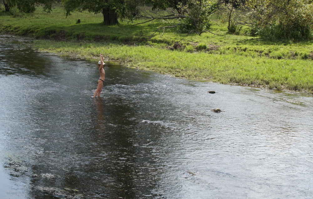Nude in river's water #106939122