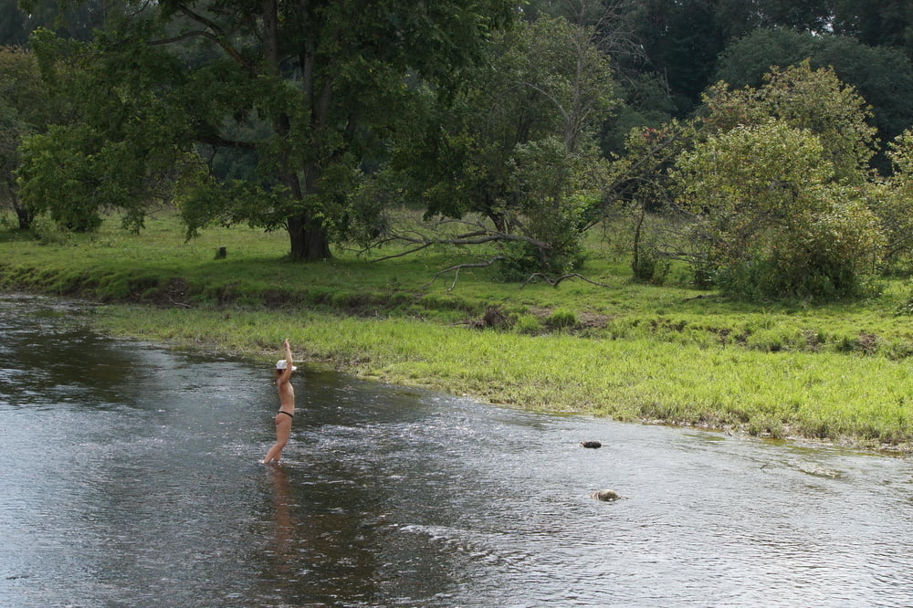 Nude in river's water #106939124