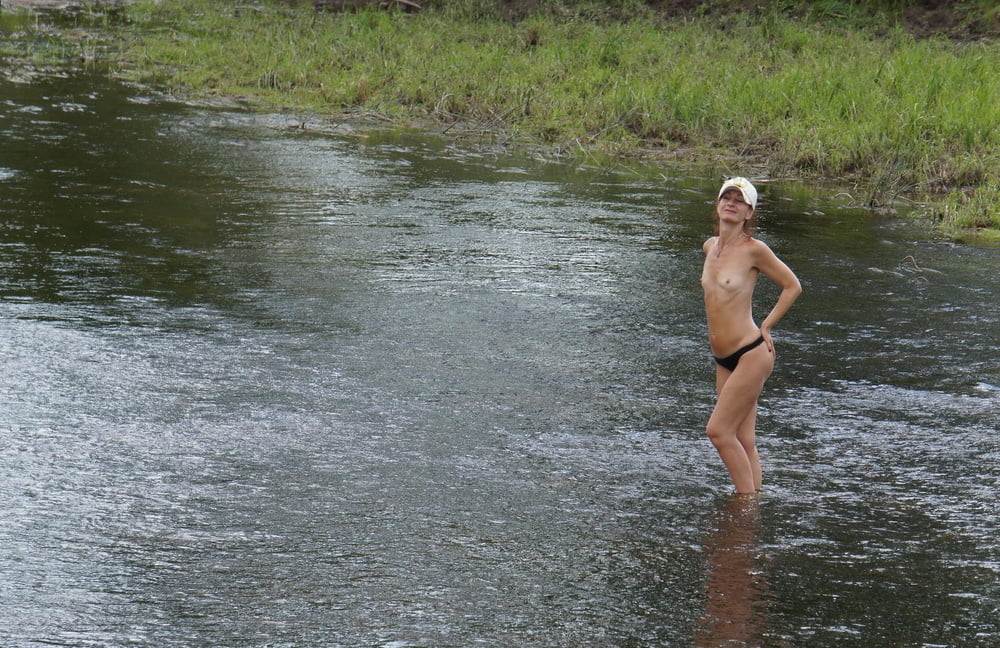 Nude in river's water #106939129