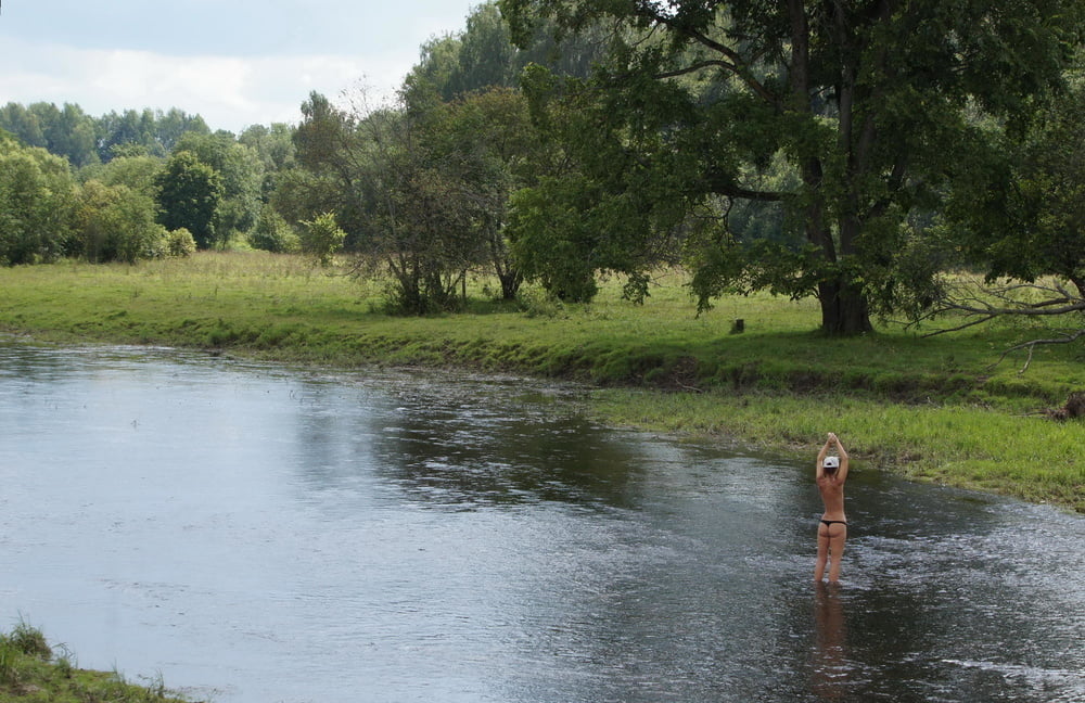 Nude in river's water #106939130