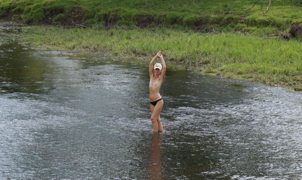 Nude in river's water #106939131