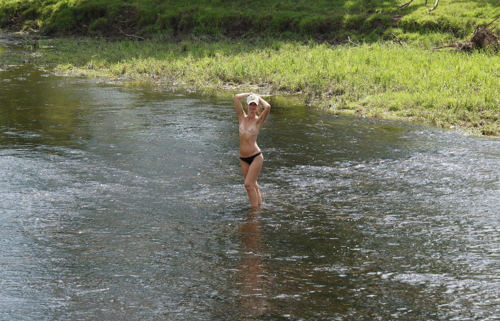 Nude in river's water #106939133