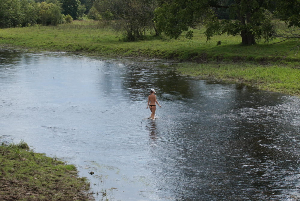 Nude in river's water #106939142