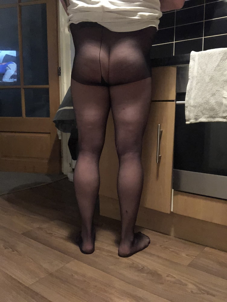In the kitchen wearing tights #106965232