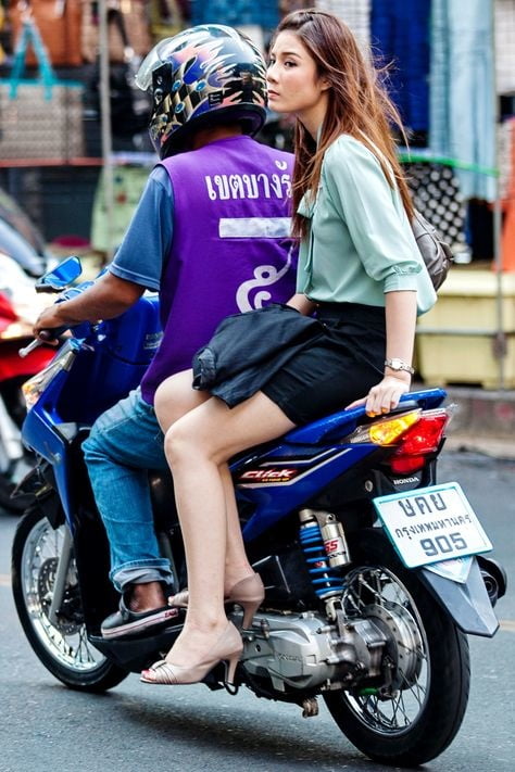 Thai girls on bikes #102948347