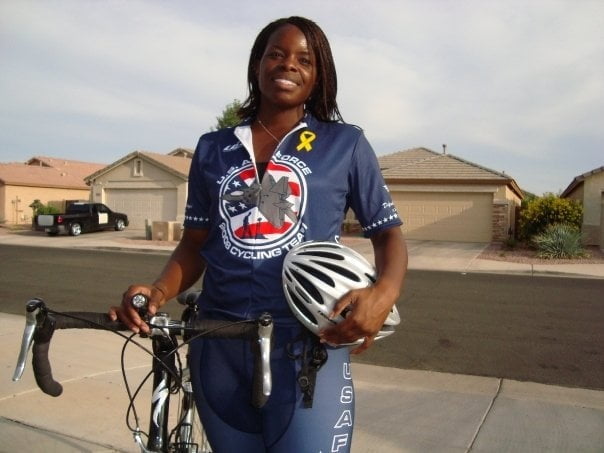 Ebony Spandex Cyclists #93578166