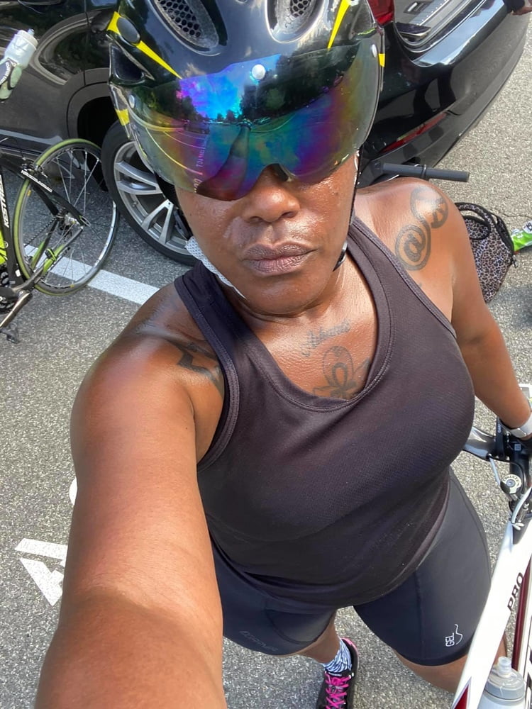 Ebony Spandex Cyclists #93578303
