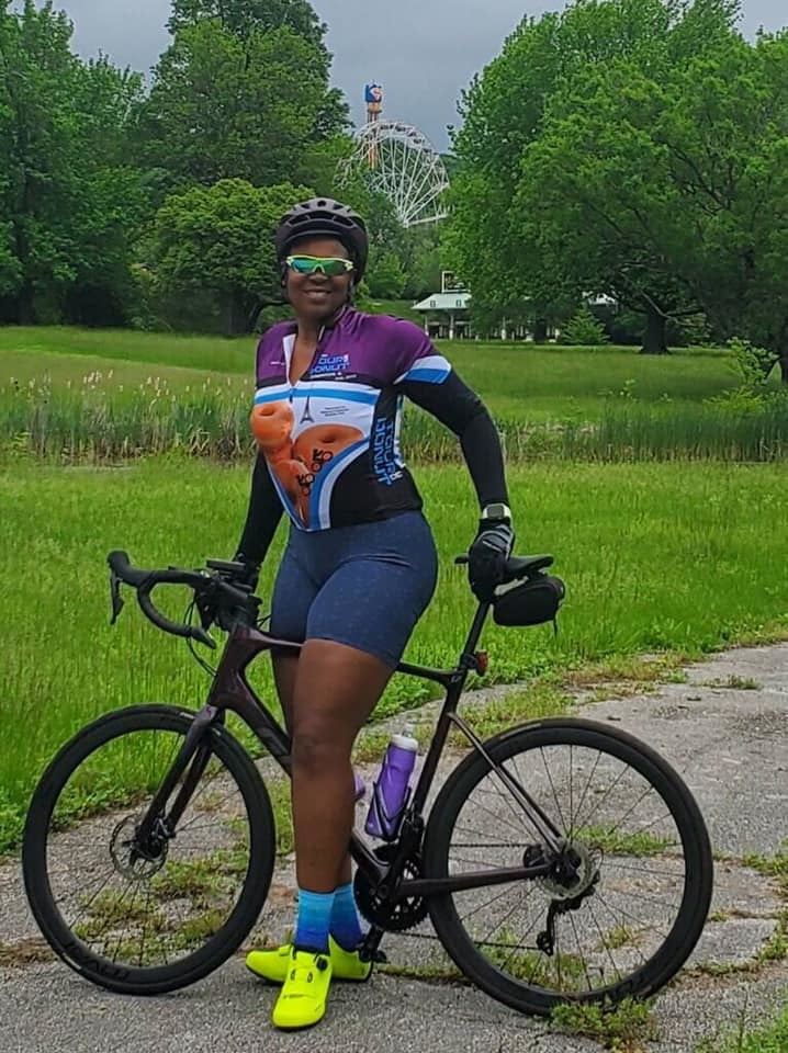 Ebony Spandex Cyclists #93578322