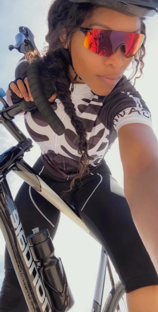 Ebony Spandex Cyclists #93578439