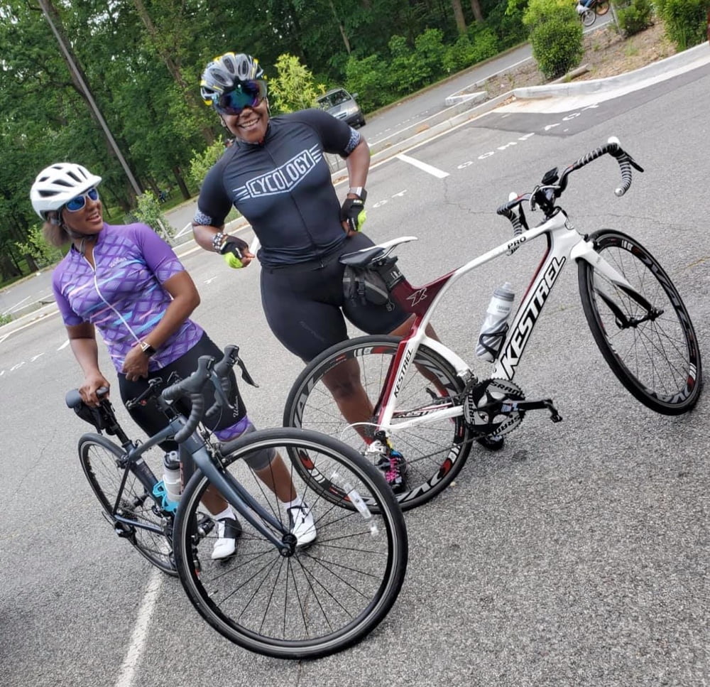 Ebony Spandex Cyclists #93578462