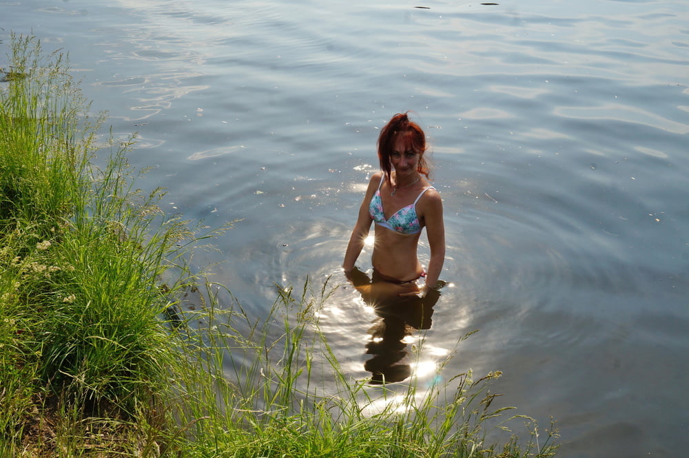 In the pond, in the glare #107008144