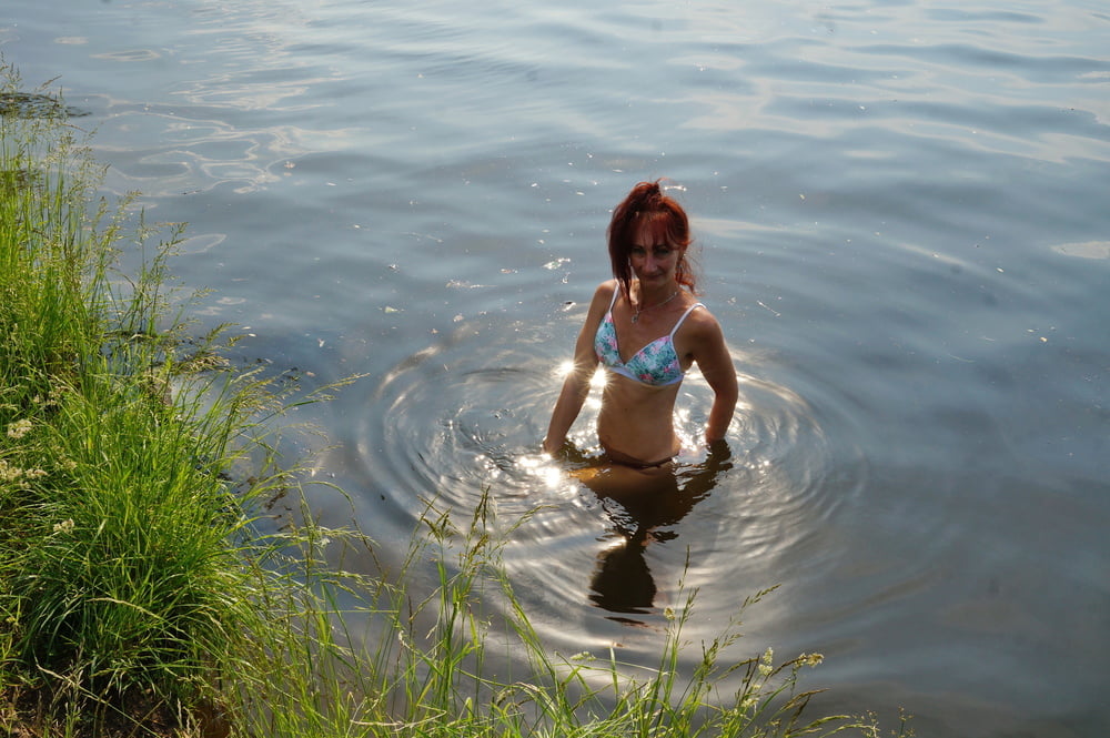 In the pond, in the glare #107008145
