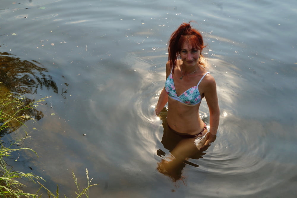 In the pond, in the glare #107008157