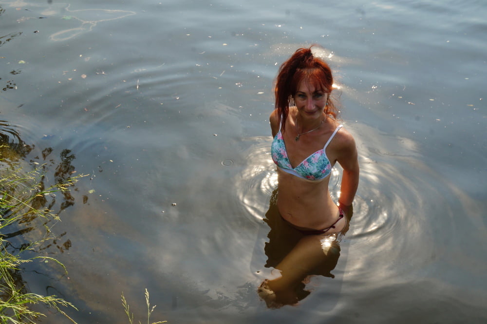 In the pond, in the glare #107008161