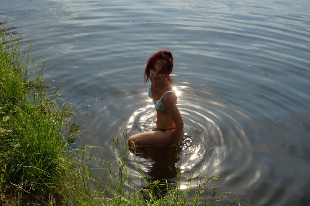 In the pond, in the glare #107008180