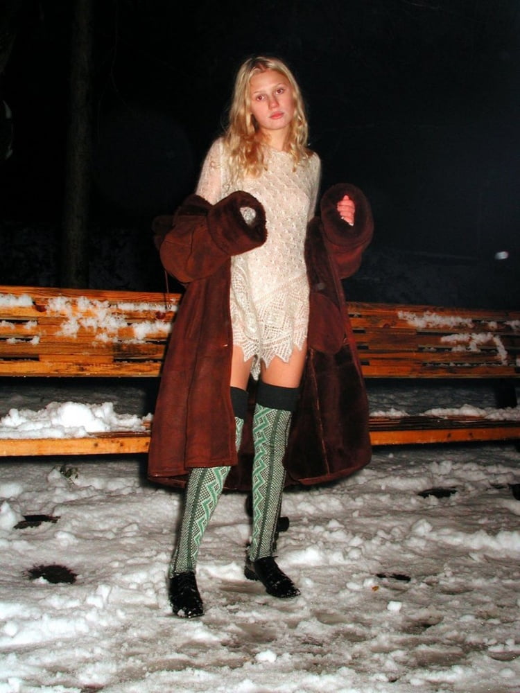 Nice blonde in fur coat posing #102729778