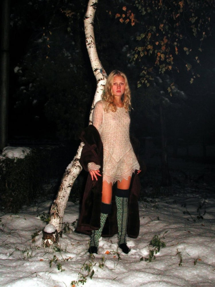 Nice blonde in fur coat posing #102729780