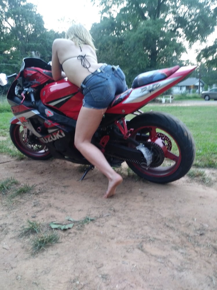 Sexy girl poseing on my bike #106296179