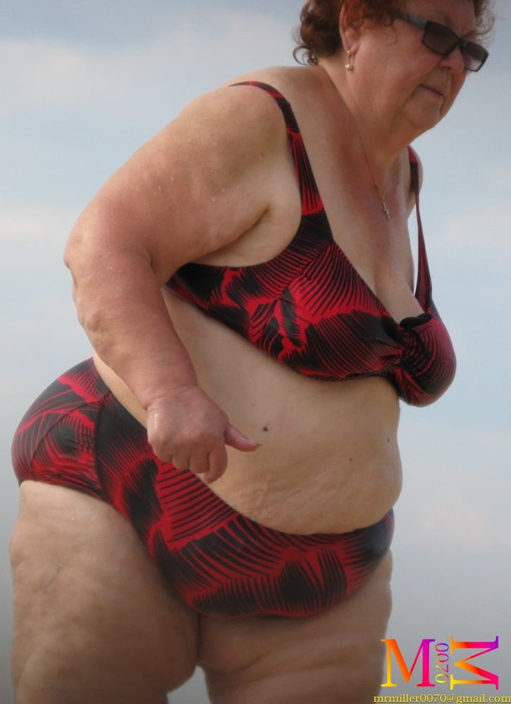 Huge Belly Granny on the beach #90386031