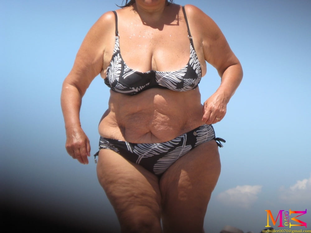 Huge Belly Granny on the beach #90386033