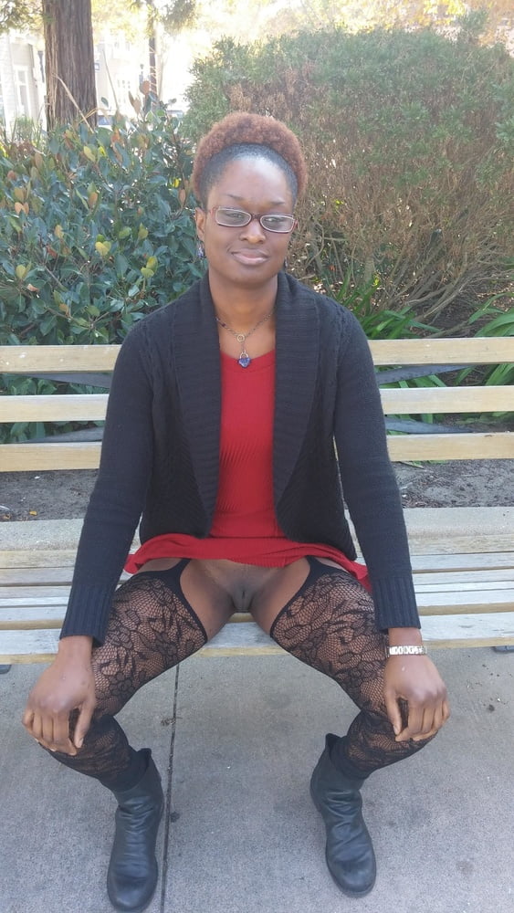 Black ebony MILF flashes her cunt upskirt in park #93754007