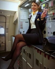 Sexy Stewardess in Fersen und Strümpfen
 #92963340