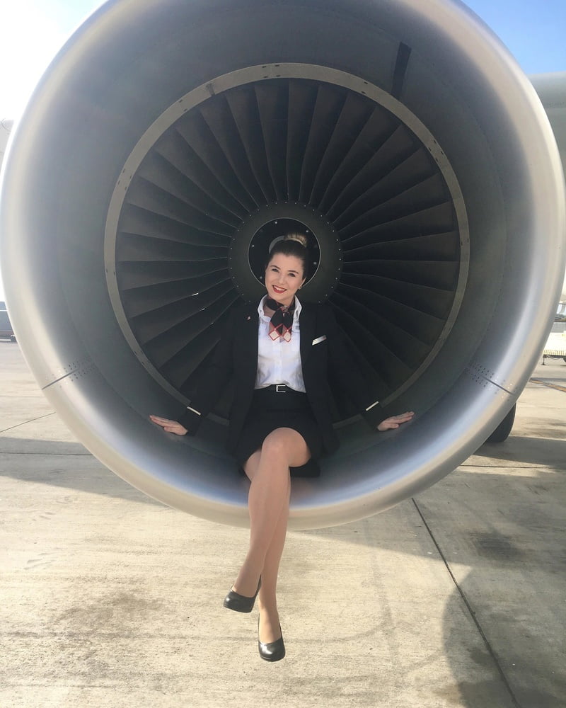 Sexy Stewardess in Fersen und Strümpfen
 #92963346