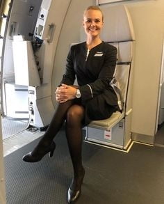 Sexy Stewardess in Fersen und Strümpfen
 #92963362