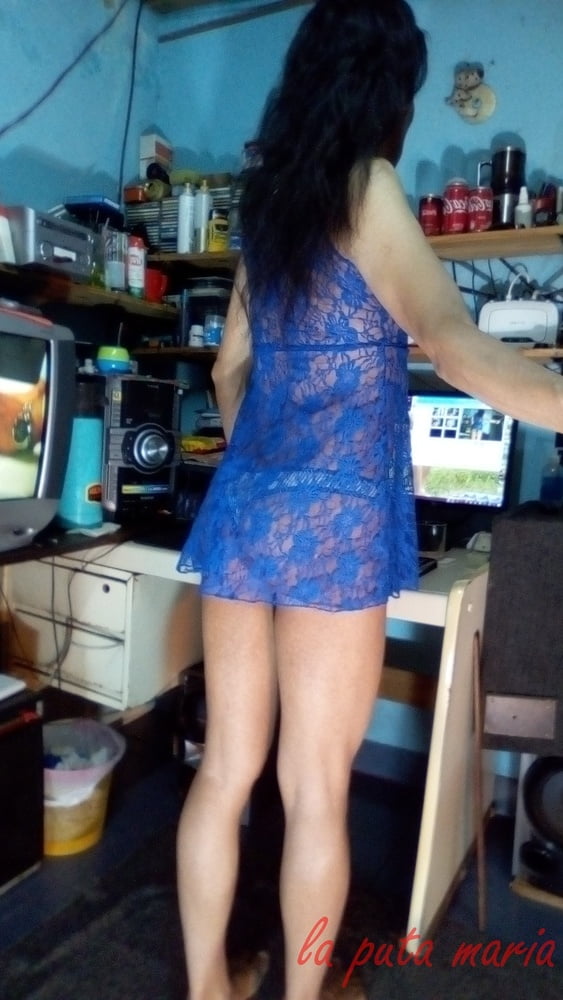 the whore maria wearing a blue dress #106678152