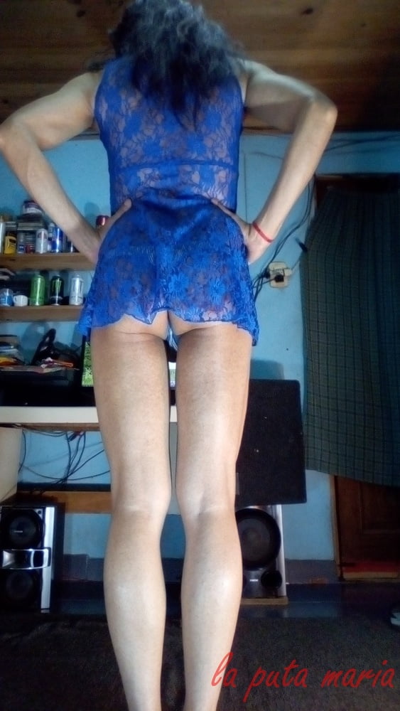 the whore maria wearing a blue dress #106678155
