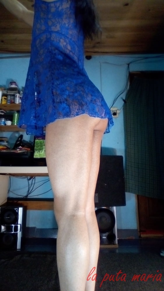 the whore maria wearing a blue dress #106678156