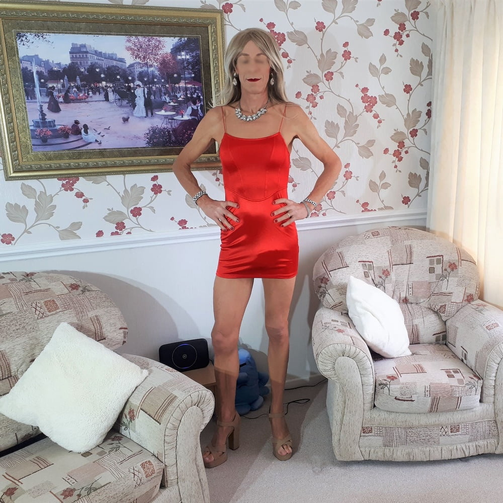 Alessia Travestita models red silk bodycon minidress #107075078
