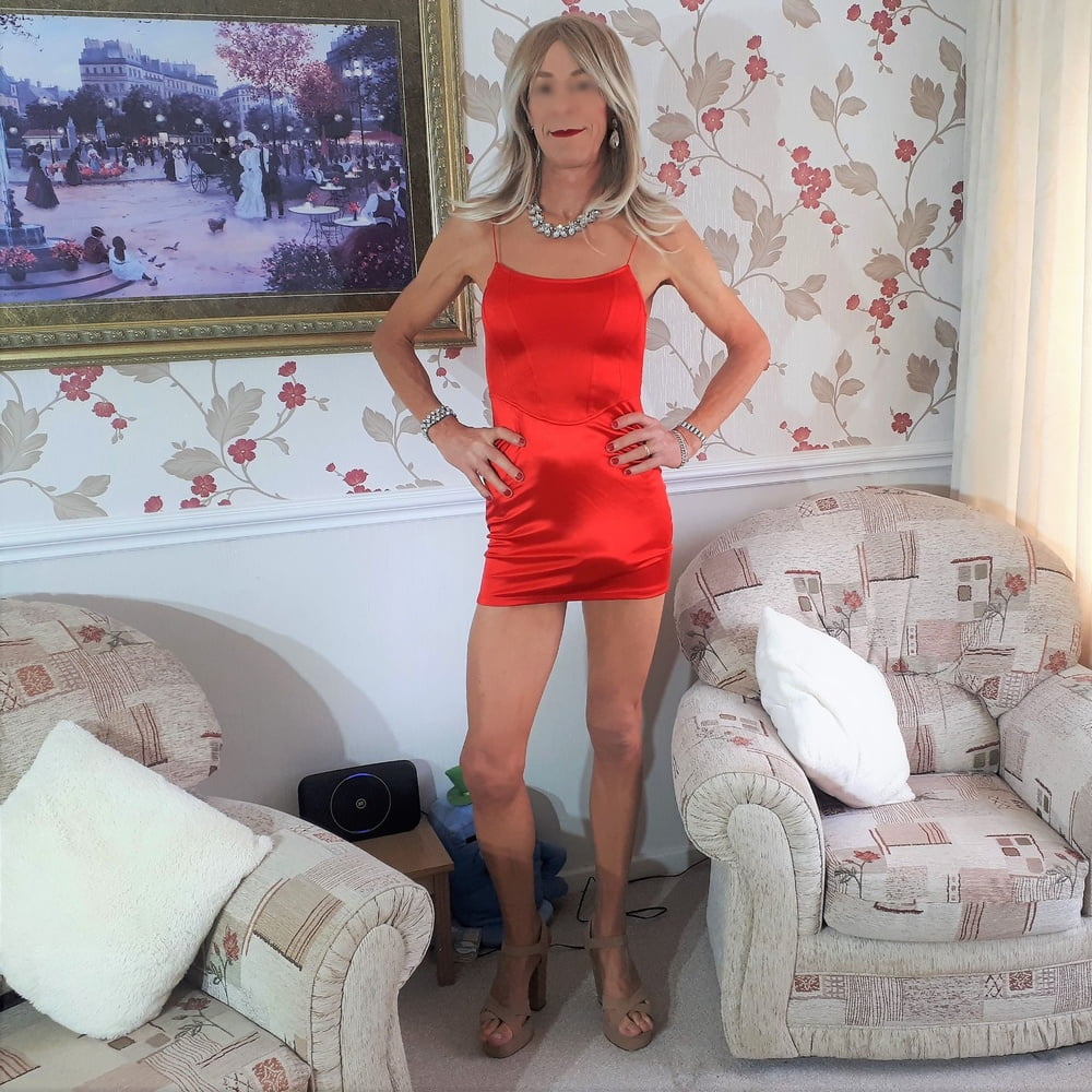Alessia Travestita models red silk bodycon minidress #107075087