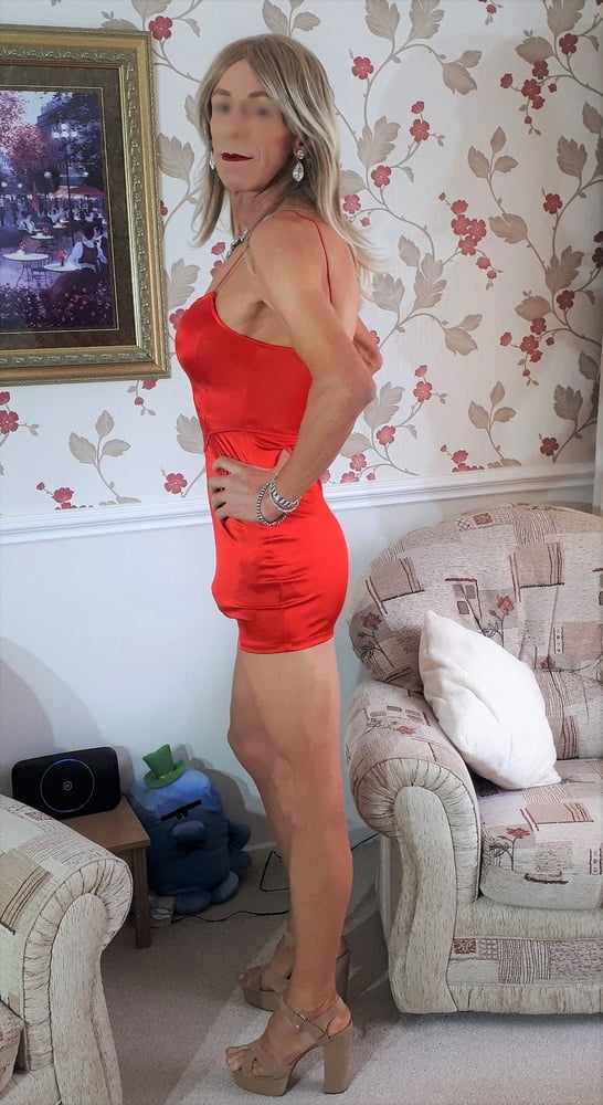 Alessia Travestita models red silk bodycon minidress #107075090
