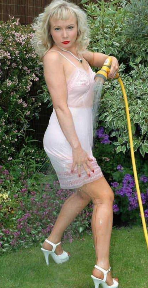 Sue wets her slip in the garden #103667438