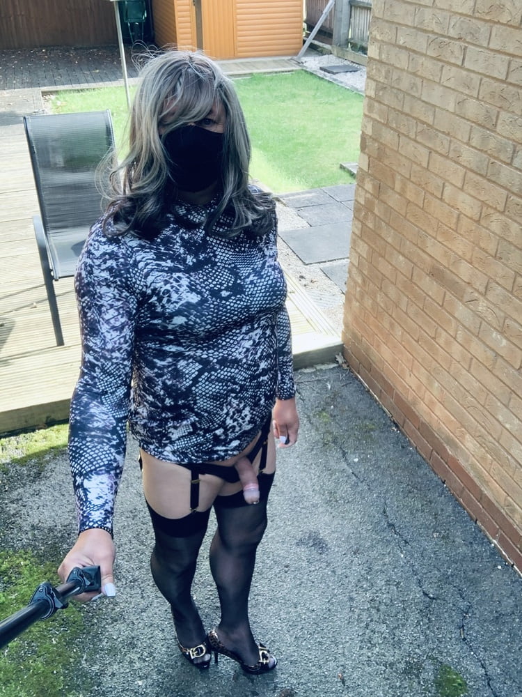 Kelly in snake skin pattern dress and black stockings #106968442