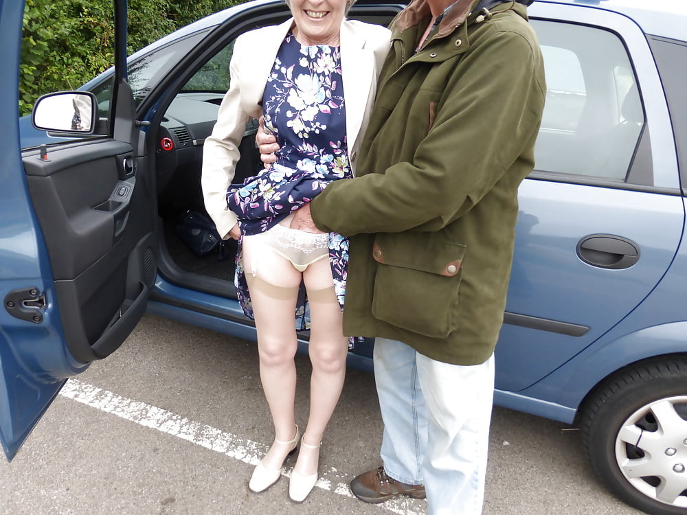 Mature Lady and a Car #92840873