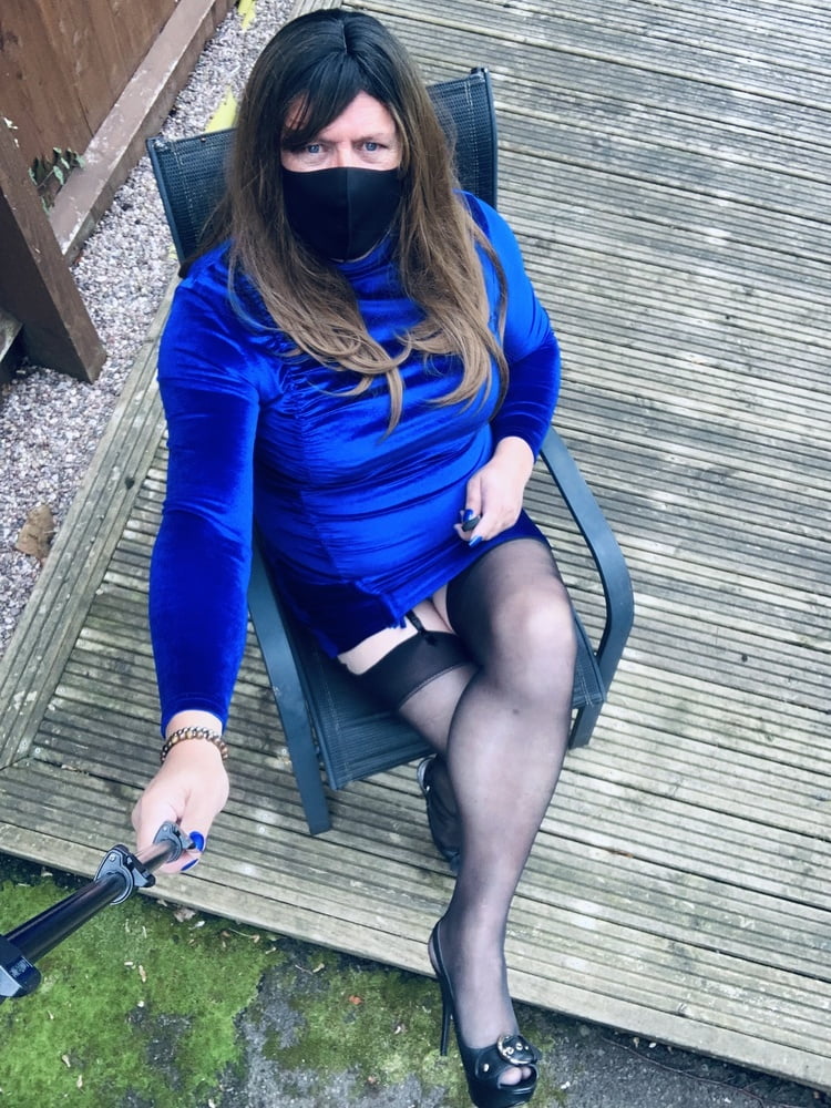 Kelly in blue velvet dress in stockings and heels #106851852