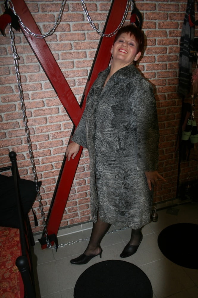 Posing in a gray fur coat #88710535