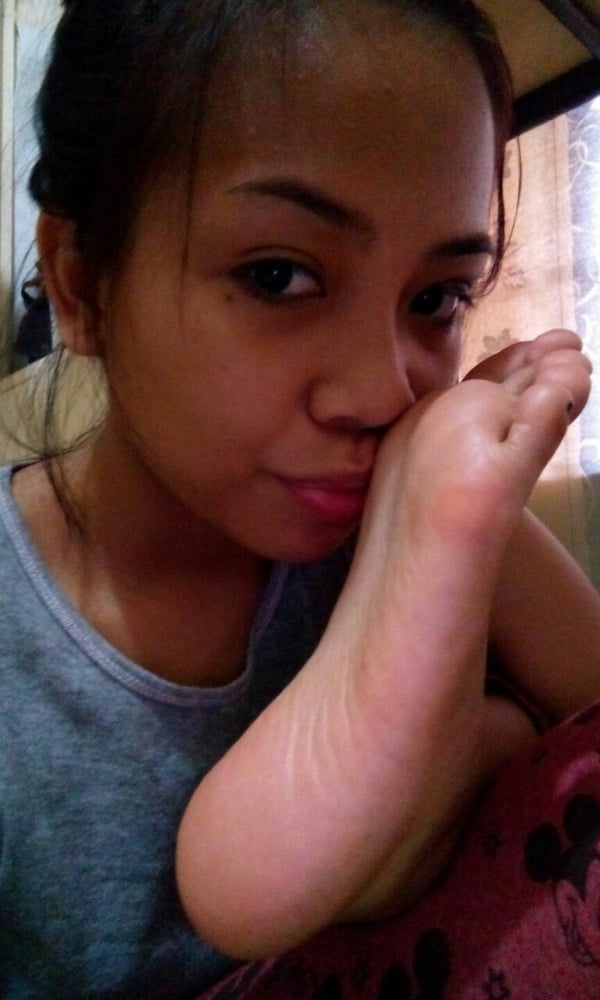 Girls Smelling Own Feet #92726802