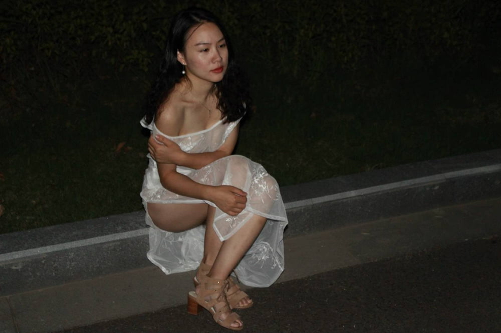Chinese girl flashing in public #95211591